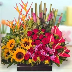 Sol Tropical – Arreglo de Girasoles, Rosas y Flores Tropicales