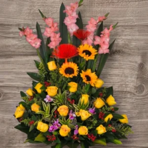 Celebración Dorada – Arreglo de Girasoles, Rosas y Flores Tropicales